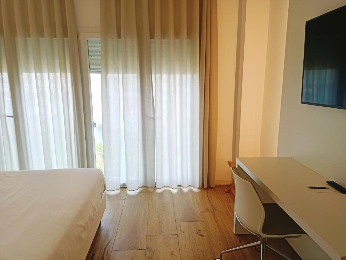Toscana Charme Resort Tirrenia Exteriör bild A room at the hotel